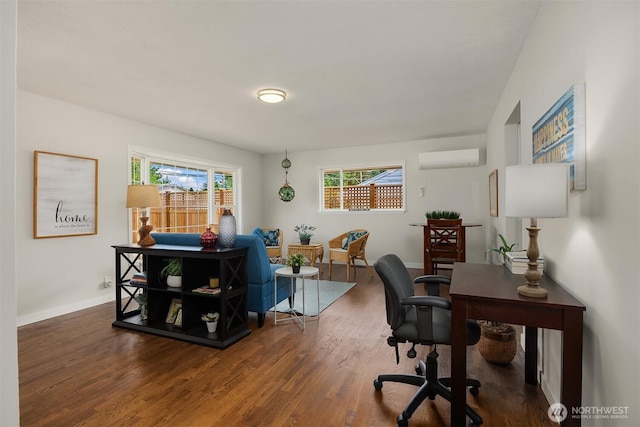 7337 19th Ave SW, Seattle, WA 98106 - office area with a wall mounted air conditioner and wood finished floors