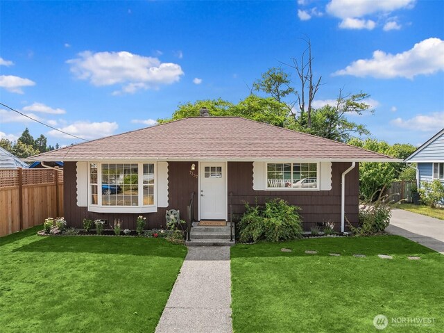 7337 19th Ave SW, Seattle, WA 98106 - bungalow-style home featuring roof with shingles and a chimney
