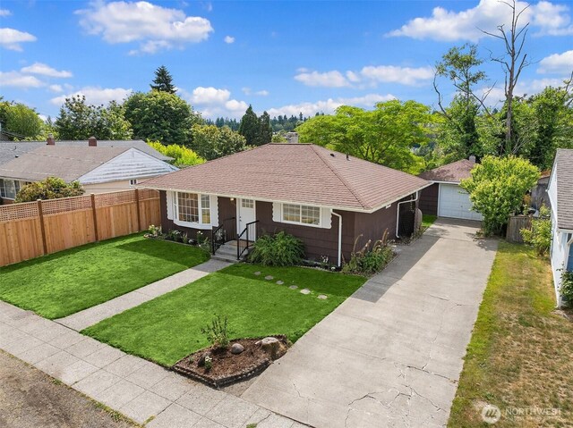 7337 19th Ave SW, Seattle, WA 98106 - view of front of house featuring a garage and an outbuilding