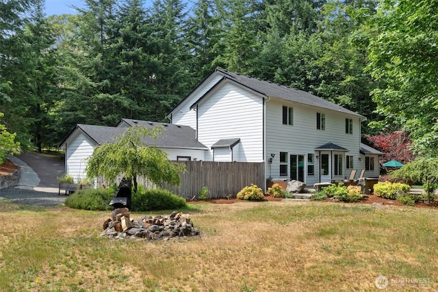 6211 18th Ave SW, Olympia, WA 98512 - rear view of house with a fire pit