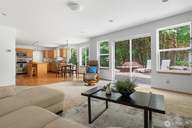 6211 18th Ave SW, Olympia, WA 98512 - living room featuring a chandelier and recessed lighting