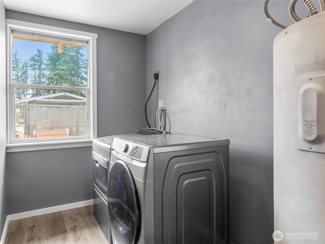 16002 5th Ave E, Tacoma, WA 98445 - laundry room with separate washer and dryer and wood finished floors
