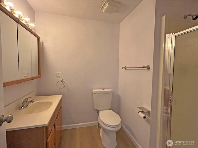 5519 65th Ave SE, Olympia, WA 98513 - bathroom with a shower stall, vanity, and wood finished floors