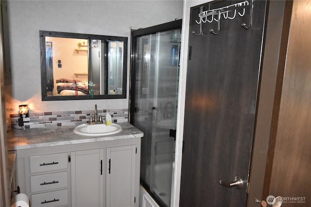 112 Primrose Ln, Cinebar, WA 98533 - bathroom featuring vanity, backsplash, ensuite bathroom, and a shower with shower door