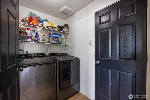 5421 Jackson Ln, Pasco, WA 99301 - laundry area with separate washer and dryer and baseboards