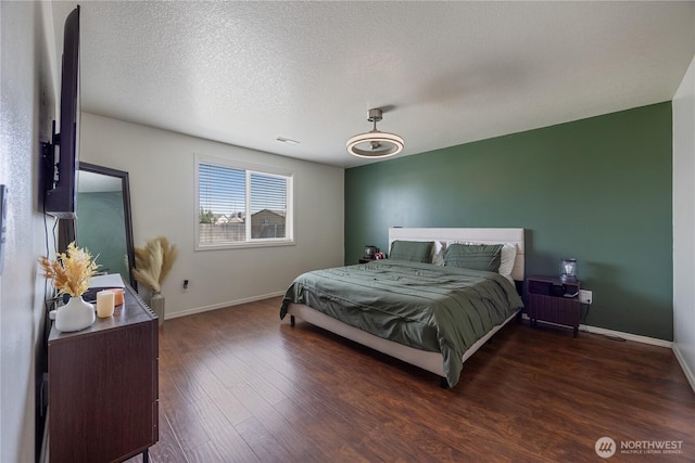 5421 Jackson Ln, Pasco, WA 99301 - bedroom with wood finished floors and a textured ceiling
