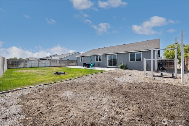 5421 Jackson Ln, Pasco, WA 99301 - back of property with an outdoor fire pit, a patio, a fenced backyard, and a shingled roof