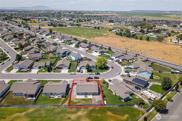 5421 Jackson Ln, Pasco, WA 99301 - aerial perspective of suburban area featuring a mountainous background and property boundaries highlighted