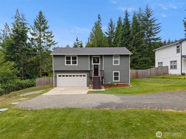 1172 Thorndyke Rd, Port Ludlow, WA 98365 - bi-level home with concrete driveway and a garage