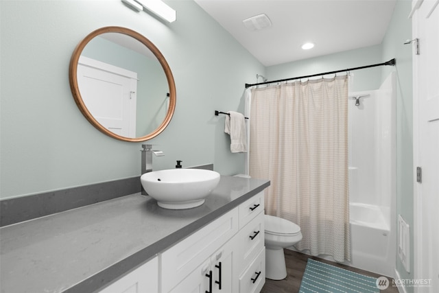 1172 Thorndyke Rd, Port Ludlow, WA 98365 - bathroom with vanity, shower / tub combo with curtain, wood finished floors, and recessed lighting