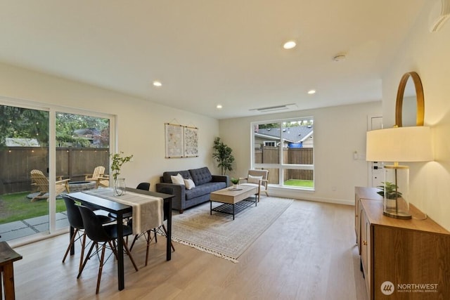 10342 39th Ave NE, Seattle, WA 98125 - living room featuring plenty of natural light, light wood finished floors, and recessed lighting