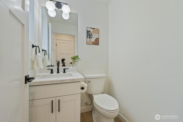 10342 39th Ave NE, Seattle, WA 98125 - bathroom featuring vanity and wood finished floors