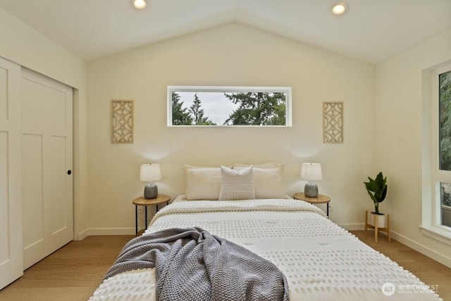 10342 39th Ave NE, Seattle, WA 98125 - bedroom with lofted ceiling, wood finished floors, and recessed lighting
