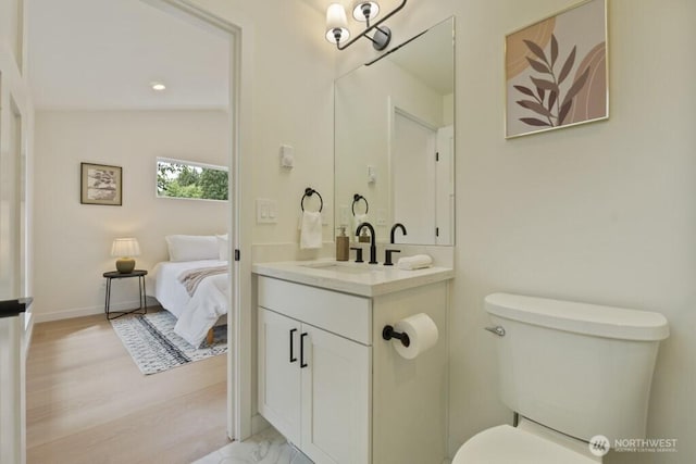 10342 39th Ave NE, Seattle, WA 98125 - bathroom featuring vanity and wood finished floors