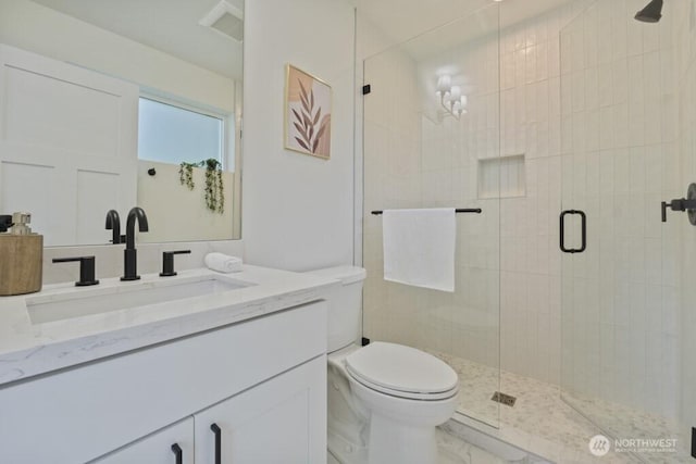 10342 39th Ave NE, Seattle, WA 98125 - bathroom with vanity, marble look tiles, and a stall shower