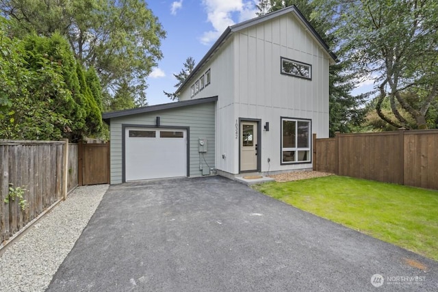 10342 39th Ave NE, Seattle, WA 98125 - view of front of home with a garage, driveway, and board and batten siding