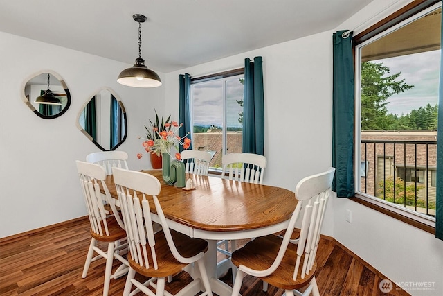 921 Pershing Ave Unit 101, Bremerton, WA 98312 - dining space featuring plenty of natural light and wood finished floors