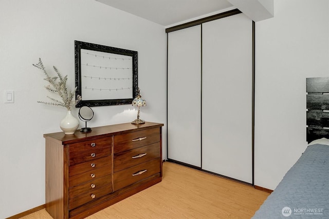 921 Pershing Ave Unit 101, Bremerton, WA 98312 - bedroom with light wood-style flooring and a closet