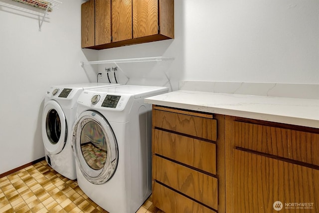 921 Pershing Ave Unit 101, Bremerton, WA 98312 - washroom featuring cabinet space, washer and dryer, and light floors