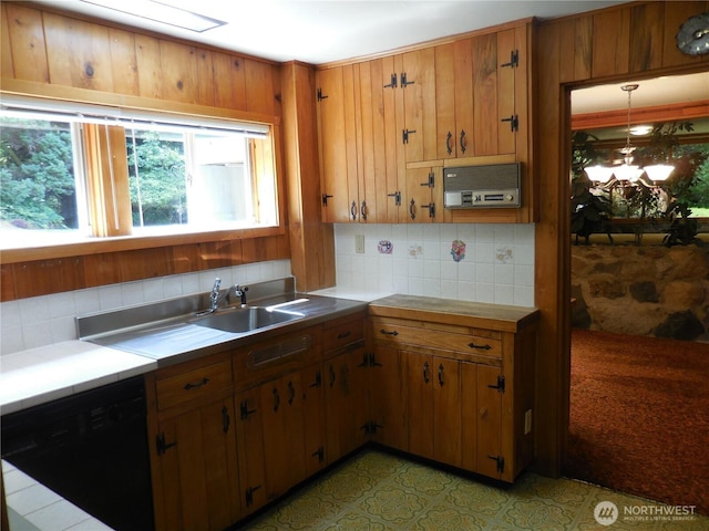 3649 Long Lake Rd SE, Port Orchard, WA 98366 - kitchen featuring dishwasher, backsplash, and brown cabinets