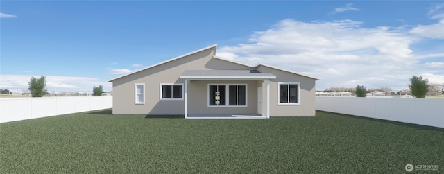 613 S Dorsing St, Moses Lake, WA 98837 - back of house with a fenced backyard and stucco siding