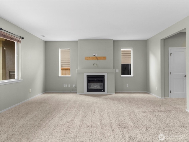 2220 166th St Ct E, Tacoma, WA 98445 - unfurnished living room with carpet and a glass covered fireplace