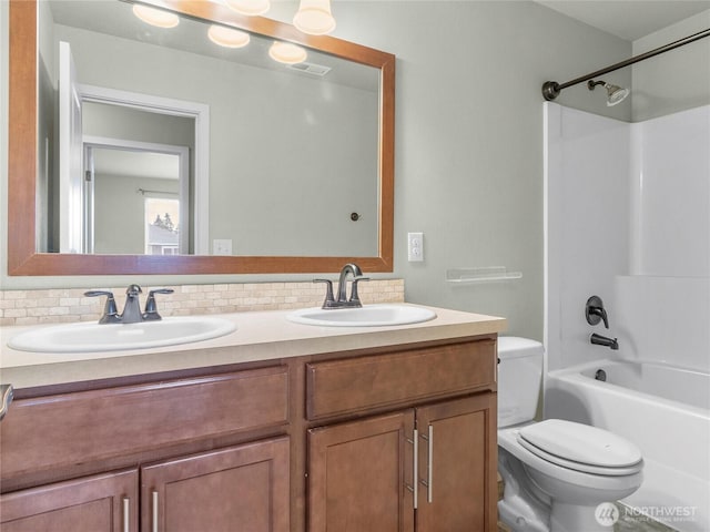 2220 166th St Ct E, Tacoma, WA 98445 - full bathroom with double vanity, backsplash, and bathtub / shower combination