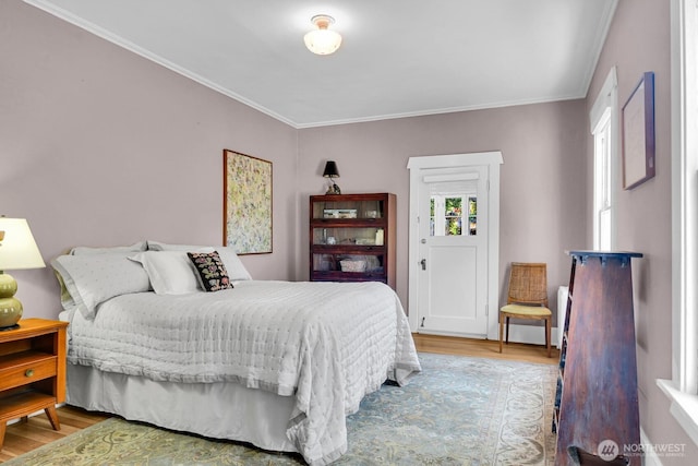4926 42nd Ave S, Seattle, WA 98118 - bedroom featuring wood finished floors and ornamental molding