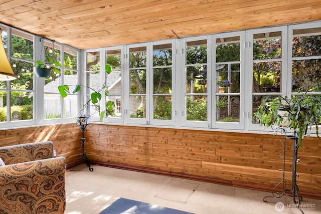 4926 42nd Ave S, Seattle, WA 98118 - unfurnished sunroom featuring wooden ceiling, plenty of natural light, wood walls, and french doors