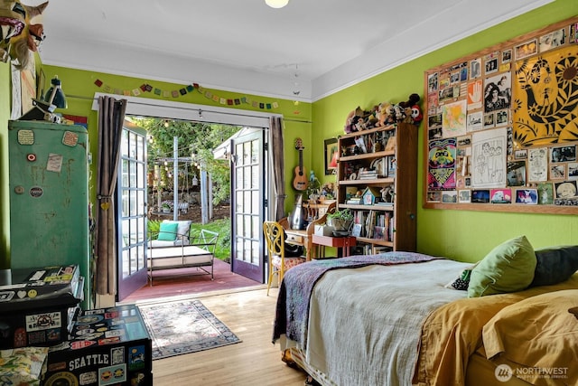 4926 42nd Ave S, Seattle, WA 98118 - bedroom with access to exterior, wood finished floors, and french doors