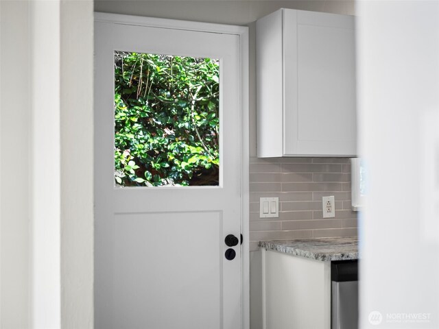 4510 N 24th St, Tacoma, WA 98406 - doorway to outside featuring healthy amount of natural light
