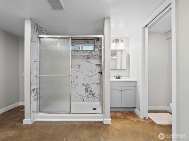 4510 N 24th St, Tacoma, WA 98406 - bathroom with concrete floors, vanity, and a marble finish shower