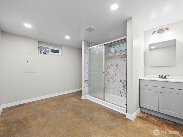 4510 N 24th St, Tacoma, WA 98406 - bathroom with concrete floors, a marble finish shower, vanity, recessed lighting, and electric panel