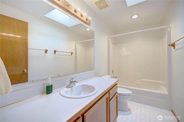 17417 28th Ave SE, Bothell, WA 98012 - bathroom featuring vanity, a skylight,  shower combination, and tile patterned floors
