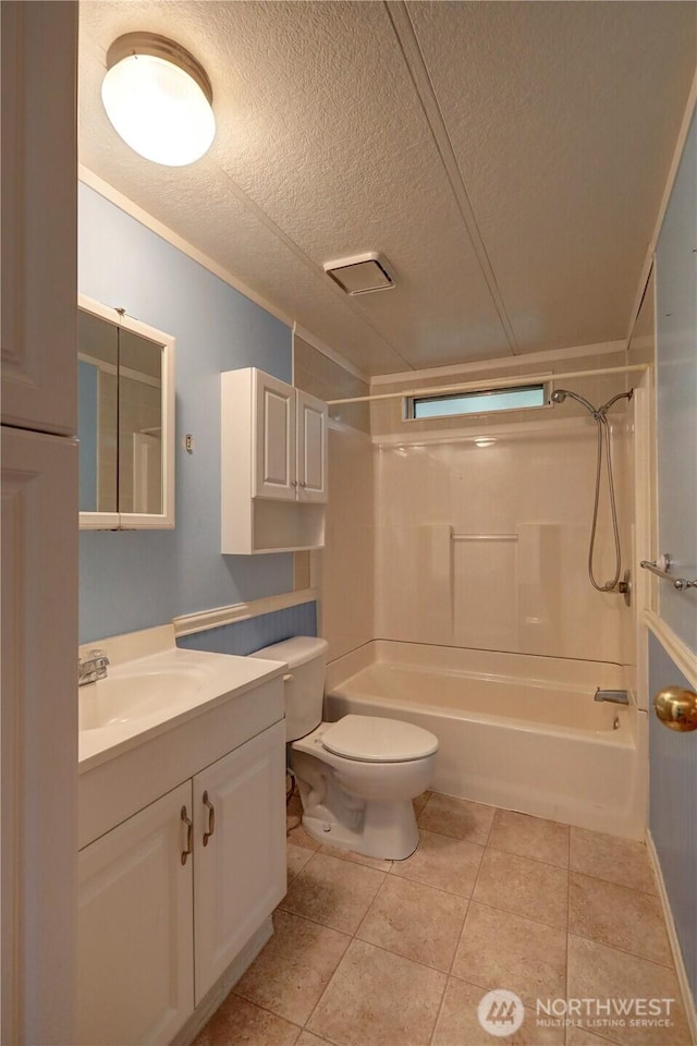 31109 202nd Ave SE, Kent, WA 98042 - bathroom with a textured ceiling, tub / shower combination, vanity, and tile patterned floors