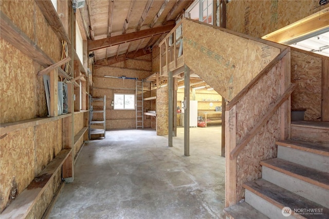 31109 202nd Ave SE, Kent, WA 98042 - misc room with high vaulted ceiling, unfinished concrete flooring, and stairs