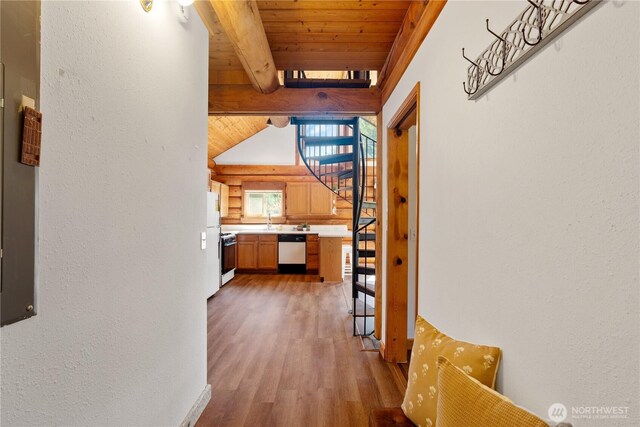 8669 Harbor Dr, Blaine, WA 98230 - hall featuring light wood-style floors, a wood ceiling with exposed beams, and a textured wall
