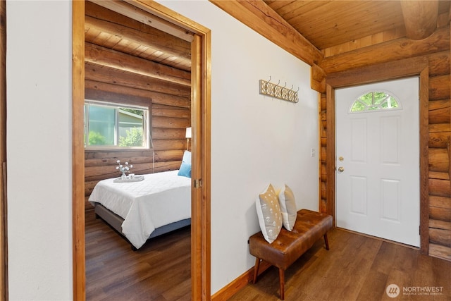 8669 Harbor Dr, Blaine, WA 98230 - entryway with rustic walls, wood finished floors, and wooden ceiling