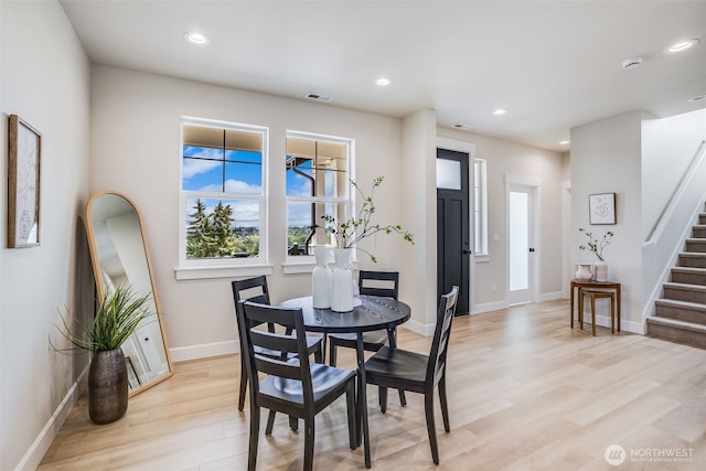 3606 E M St, Tacoma, WA 98404 - dining area with light wood-style flooring, stairway, and recessed lighting