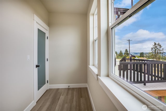 3606 E M St, Tacoma, WA 98404 - unfurnished room with wood finished floors and baseboards