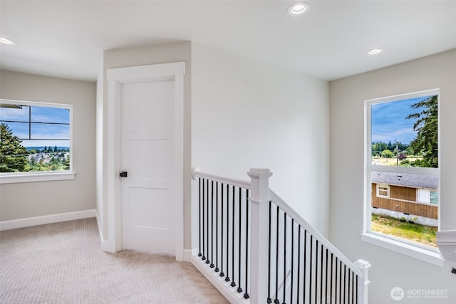 3606 E M St, Tacoma, WA 98404 - hallway featuring healthy amount of natural light, an upstairs landing, recessed lighting, and carpet floors