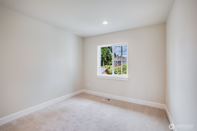 3606 E M St, Tacoma, WA 98404 - carpeted spare room with baseboards and recessed lighting