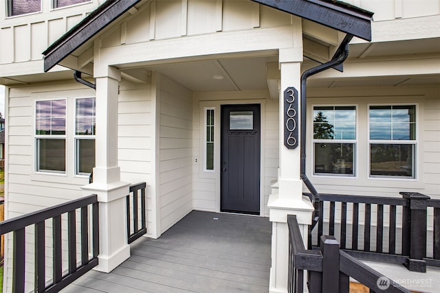 3606 E M St, Tacoma, WA 98404 - entrance to property with covered porch and board and batten siding