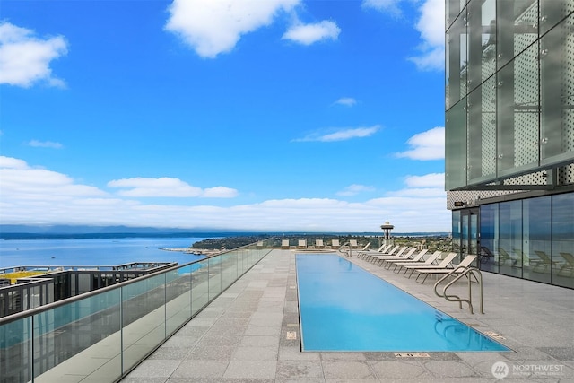 300 Virginia St Unit 1311, Seattle, WA 98101 - community pool with a water view and a patio area