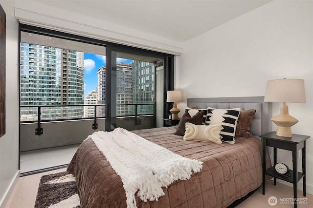 300 Virginia St Unit 1311, Seattle, WA 98101 - bedroom with a city view and baseboards