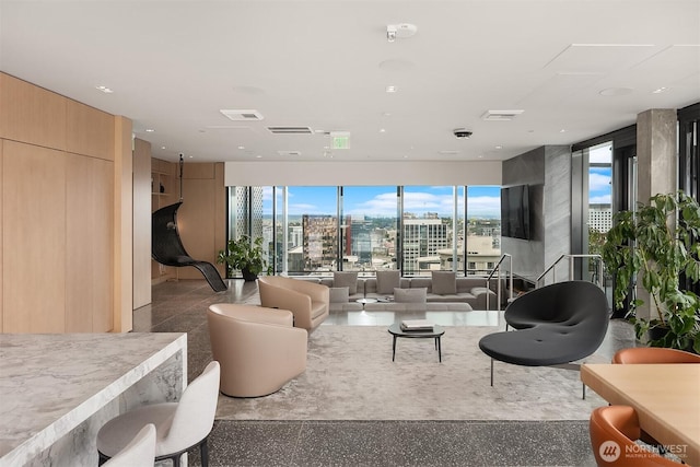 300 Virginia St Unit 1311, Seattle, WA 98101 - living area featuring a city view and plenty of natural light