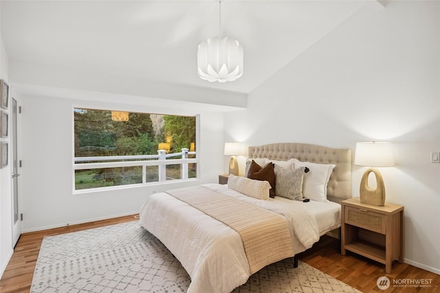 1564 Hillside Dr SE, Issaquah, WA 98027 - bedroom featuring wood finished floors and lofted ceiling