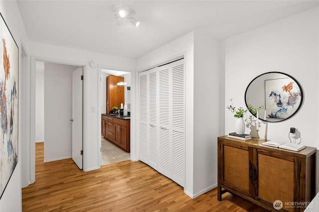 1564 Hillside Dr SE, Issaquah, WA 98027 - corridor with light wood-style floors and baseboards
