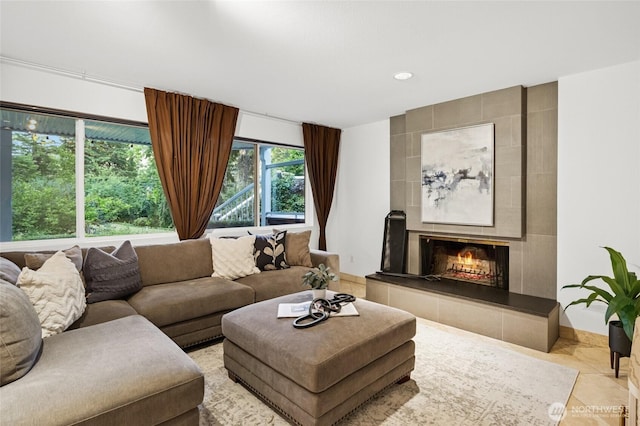 1564 Hillside Dr SE, Issaquah, WA 98027 - tiled living area featuring a tile fireplace and recessed lighting