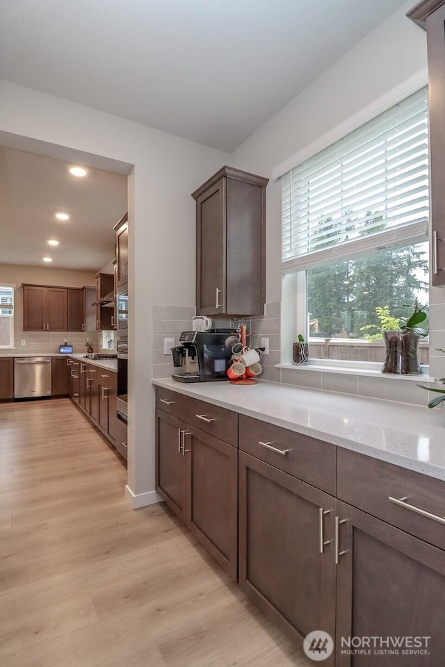 16321 SE 133rd Pl, Renton, WA 98059 - kitchen with stainless steel appliances, plenty of natural light, decorative backsplash, and recessed lighting